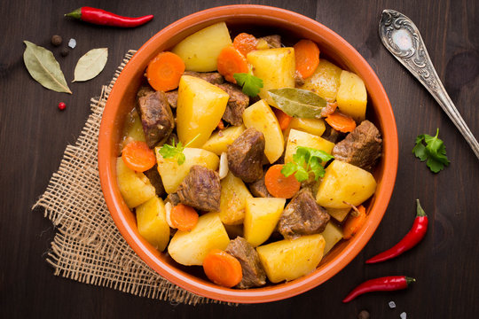 Beef stew with vegetables potatoes, carrots, delicious autumn dish, gravy