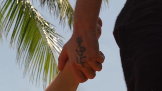 Foot massage outdoor. Yoga massagiste making foot massage to woman for muscule relaxation and body recovery. Thai and yoga massage. Alternative and traditional medicine concept.