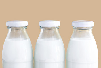Three bottles of milk.