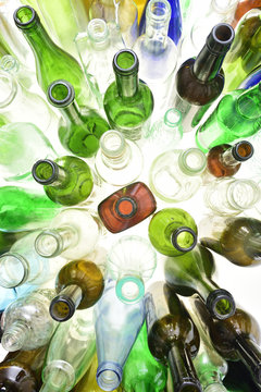 top view of glass bottles on white
