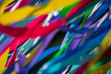 Multicolored ribbons on holiday as an abstract background