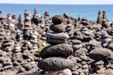 Stack of stones on the sea beach