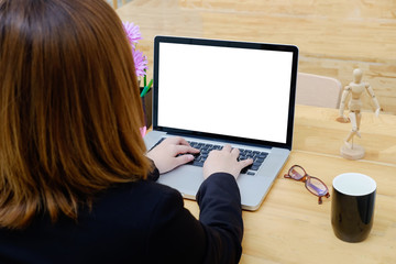 Fototapeta na wymiar Businesswoman using mock up laptop computer with empty blank display.