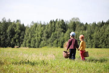 Children go to the forest for mushrooms