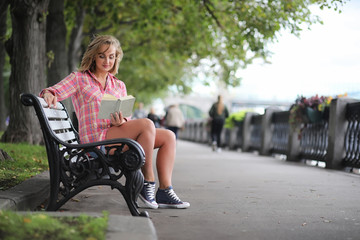 Beautiful girl in the summer park