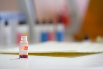 Blood test.Medical bottle with blood for examination with blood
