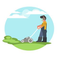 A man cuts the grass with a lawnmower