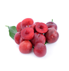 Close up red plum isolated on white background