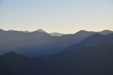 Fototapeta na wymiar Mountains at sunrise