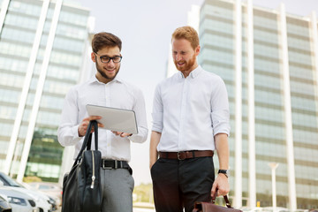 Business people talking outdoors