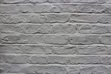 Abstract weathered textured brick wall background.