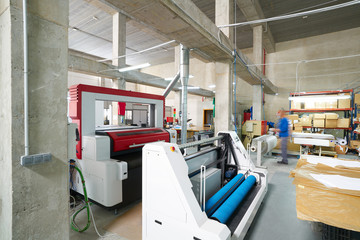Laser cutting machine for textile transfer industry