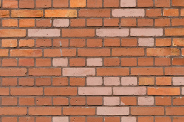 Brick wall background with red bricks