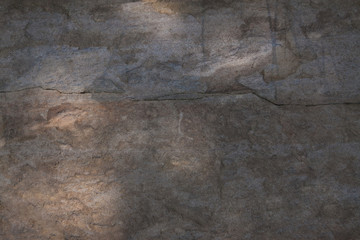 Stone surface with crack photographed from above
