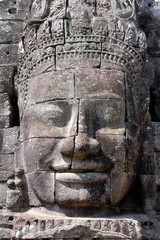 Close up of a smiling buddha at Bayon Temple, Angkor Wat, Cambodia