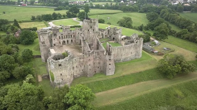 Aerial view of the ruins of a medieval castle (Raglan Castle, Wales)