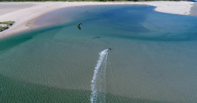 Elliott Heads, Queensland / Australia - November 2017 - Kite Surfer carving up Elliott Heads Beach