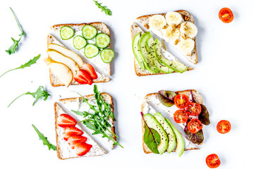 homemade sandwiches composition on white table background top vi