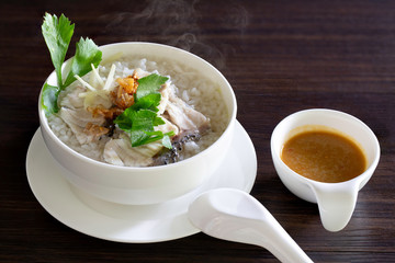 Boiled rice with sea bass in white bowl delicious food for thai breakfast and dinner