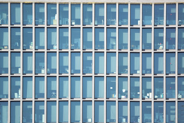 Skyscraper office building facade. Blue tone frame background and empty copy space for Editor's text.