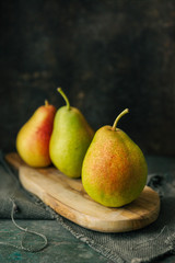Pear on rustic background