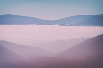 far mountains with morning fog in the valley