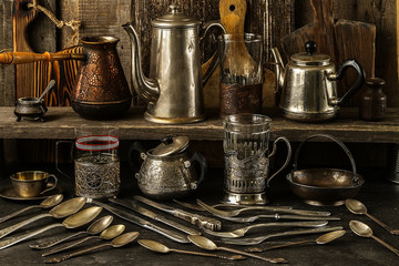 Vintage silver cutlery on dark rustic background