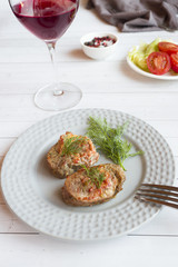 Delicious pieces of baked meat with fresh vegetables on the table