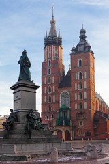 Fototapeta premium Saint Mary's Church view from Rynek Glowny Old Market square of Krakow, Poland