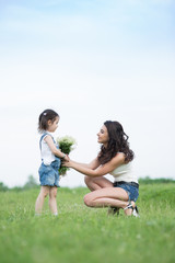 Fototapeta premium woman and child in nature