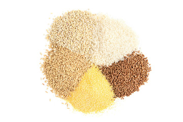 Cereals isolated on white background. Buckwheat, rice, corn grits, pearl barley and oats. Complex carbs.
