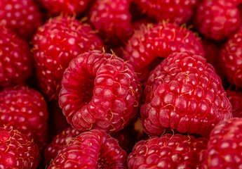 Fresh and sweet raspberries background