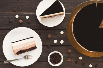 Triple chocolate layer mousse cake with glaze