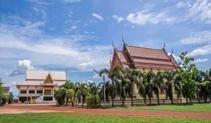 Thai temple against blue sky in Thailand