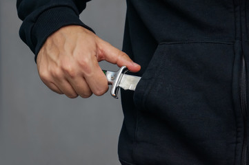 bandit pulls out his pocket folding knife to threats.