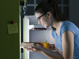 Woman having a late night snack