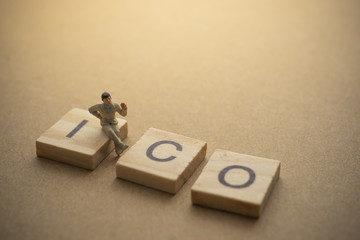 Businessman thinking about invest ICO initial coin offering concept