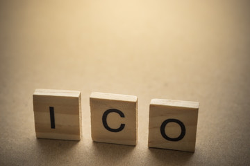 ICO on wood.