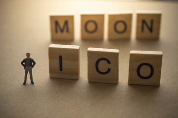 Success businessman with ICO MOON text.