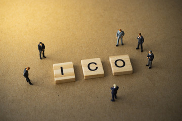 Businessmen thinking about invest ICO initial coin offering concept
