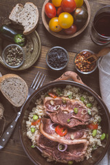 Lamb Loin Chops Freshly Roasted with Soybean and Couscous in Rustic Clay Dish