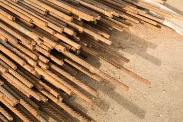 Rusty steel bar or steel reinforcement bar texture in construction site, Reinforcing Steel Bar background