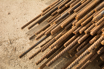 Rusty steel bar or steel reinforcement bar texture in construction site, Reinforcing Steel Bar background