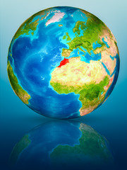 Morocco on Earth on reflective surface