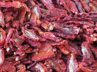 Red dried chili peppers background . Tuscany, Italy