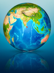 Sri Lanka on Earth on reflective surface