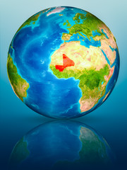 Mali on Earth on reflective surface