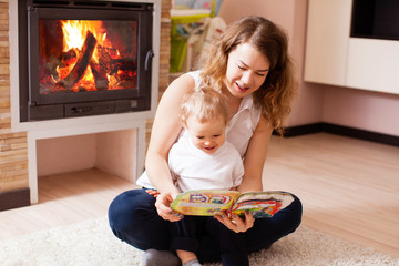 Mother helps her son to learn something new