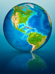 Cuba on Earth on reflective surface