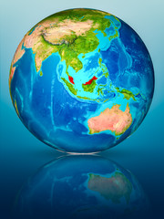 Malaysia on Earth on reflective surface